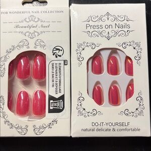 Two (2) Sets of Press on Nails Medium Length